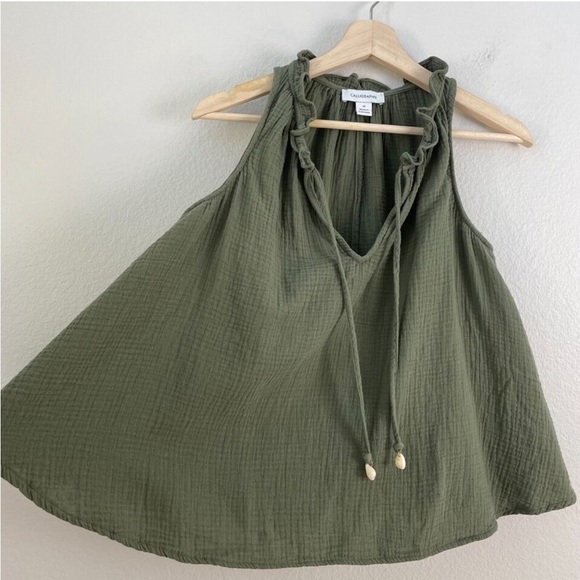 Calligraphie Women Medium
Green Seashell Tie Swing Tank Top
Sleeveless Shirt - Picture 9 of 9